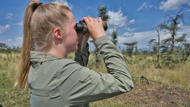 a tourist viewing wildlife